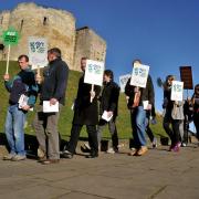 Students who are collaborating with the TUC on the York Needs a Pay Rise campaign against zero-hours contracts set off from the Eye-of-York