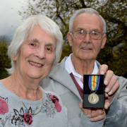 Dorothy Turpin is presented with her grandfather’s First World War medal of her relative Private George Henry Sykesby Cyril Binns, who found it the medal in Fulford
