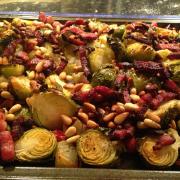 Festive sprouts with apple, pine nuts & raisins