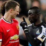 POINTED EXCHANGE: Papiss Cisse, right, remonstrates with Jonny Evans at the Spitgate at Gallowgate inciden