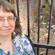 Green candidate Denise Craghill, pictured in the litter-strewn alleyway in The Groves