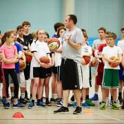 THE FORCE IS WITH US: Matt Newby passes on some tips to York Eagles Junior Basketball Club