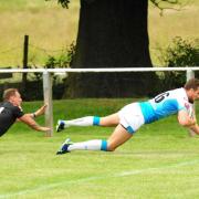 DIVING IN: James Clare scores one of his four tries against the All GoldsPicture: Anthony Chappel-Ross