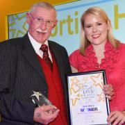 Spen Allison receives the Sporting Hero award from Sophia Monkman, of sponsors York Racecourse, at last year’s York Community Pride Awards