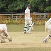 Stamford Bridge III batsman Steve Ayre suffers a knee injury running back to his crease while Yapham wicketkeeper Mark Fairey collects the ball, during the HPH York Vale League match between the teams. Picture: Nigel Holland