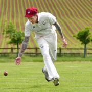 FOUR-GONE: Burn's Graham Robson, who took four wickets to help his side to a 71-run victory against Ovington. Picture: David Harrison