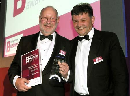 Special Achievement in Business Award winner Ron Godfrey (left) with David Dickson of Garbutt & Elliott.