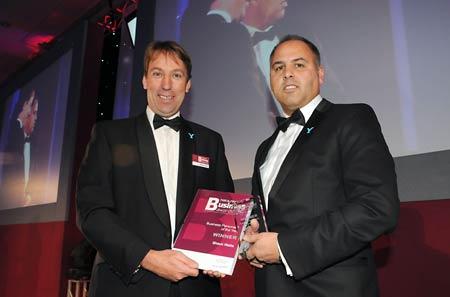 Shaun Watts (right) winning Business Personality of the Year, presented by William Derby, York Racecourse Chief Executive