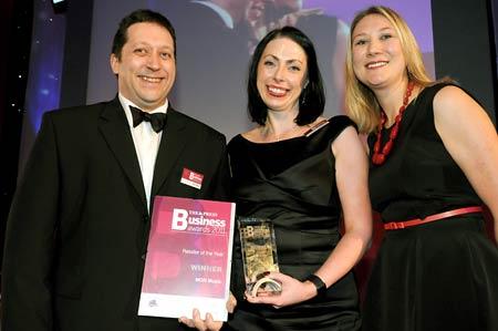 Phil and Lynn O'Dea receive the Retailer of the Year award from Sally Gilbank (right) of York Designer Outlet