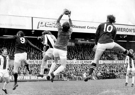 12/04/75 - York City 1, West Brom 3: Caught in this mid-air 'ballet' at Bootham Crescent are Chris Jones, West Bromich Albion's Wald and Robertson, and Jimmy Seal.