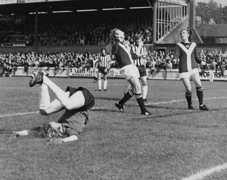 31/08/74 - York City 2, Notts County 2: With 'keeper McManus turning a somersault on the ground after being beaten by a Barry Lyons shot which hit the cross bar, Ian Holmes (centre) and Jimmy Seal look on in dis-belief as the ball rebounds out of play
