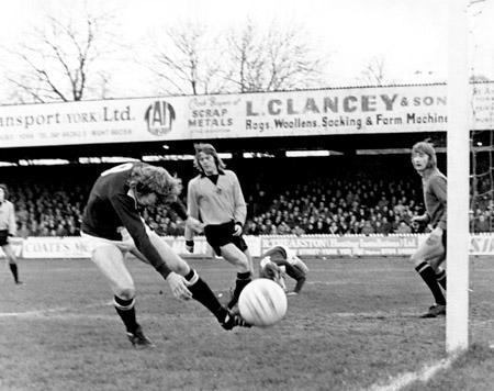 28/12/74 - York City 3, Hull City 0: Centre forward Jimmy Seal just fails to connect as the ball whips across the Hull City goalmouth.