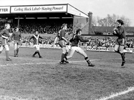 26/04/75 - York City 0, Oldham Athletic 0: Oldham keeper Odgen saves a shot from Butler with Chris Jones challenging.