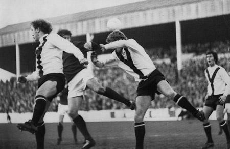 06/12/75 - York City 1, Hull City 2: Jimmy Seal and Barry Swallow go up fo foil Nottingham Forest striker Barry Butlin following a corner in the game at the City ground. Peter Creamer is on the right.