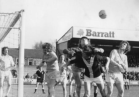 20/03/76 - York City 3, Nottingham Forest 2: Nottingham Forest goalkeeper Peter Wells appears to be blowing away this corner from Brian Pollard... but in fact he punched away from the head of Jim Hinch in a thrilling 3-2 City win at Bootham Crescent.