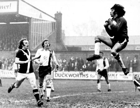 07/02/76 - York City 2, Luton Town 3: Luton 'keeper Keith Barber claims a Jimmy Seal headed effort, with Ian Holmes rushing in to challenge.