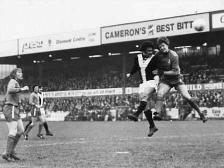 13/03/76 - York City 1, Oldham 0: City's Micky Cave races in to head into the net past a static Oldham defence from a free kick.
