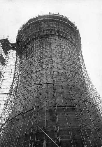 York power station - scaffolding surrounds the 165ft cooling tower in Foss Islands Road as it is prepared for demolition in 1977