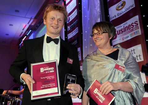 Young Entrepreneur winner Edward Wilkinson on stage with the Dean of York St John Business School, Jackie Mathers.