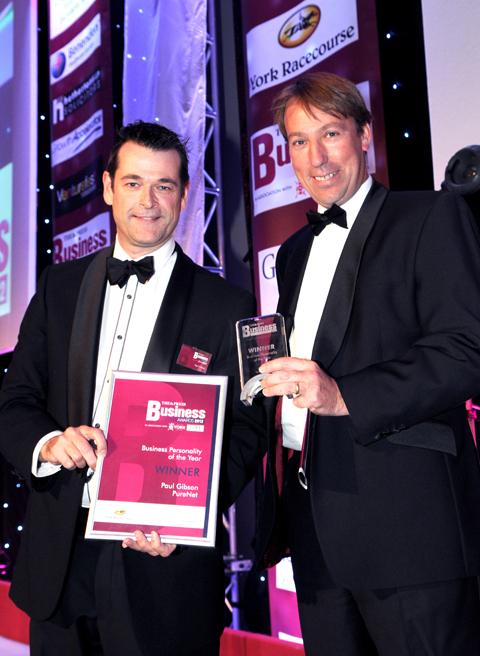 York Racecourse Chief Executive William Derby (right) presents the Businees Personality of the Year Award to Paul Gibson of PureNet.