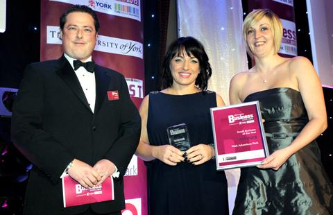 Janice Dunphy (centre) and Claire Moxon, of Web Adventure Park, receive the Small Business of the Year award from Simon Crack of Hethertons Solicitors.