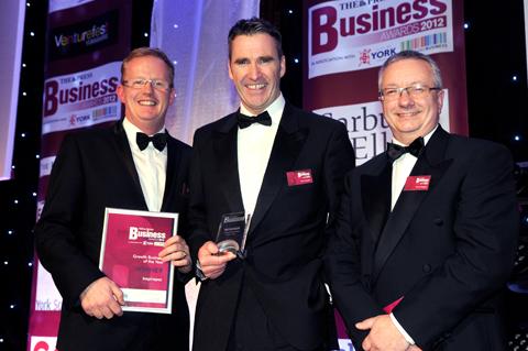 CY Coach Phil McTaggart (right) presents the Growth Business of the Year Award to Inspirepac's Mark Hawkins (left) and Chris Marples.