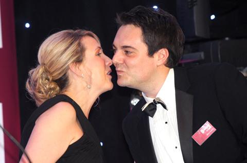 James Buffoni of the Ryedale Group steals a kiss on stage from presenter Kate Walby.