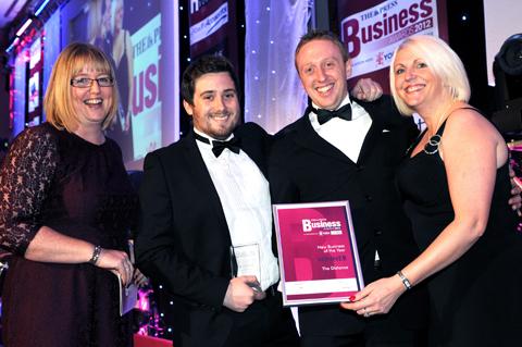 Tracey Smith (left) of York Science Park presents the New Business of the Year Award to (from left) Ryan Atkins, Anthony Main and Anne-Marie Daniels of The Distance.