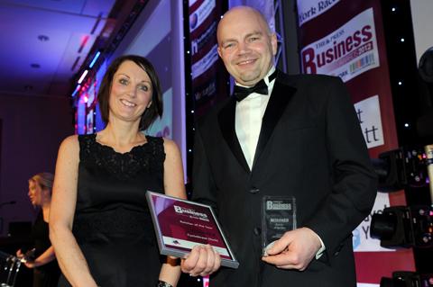 York Designer Outlet's Amy Watkinson presents the Retailer of the Year Award to Jon Dean of CycleStreet (York).
