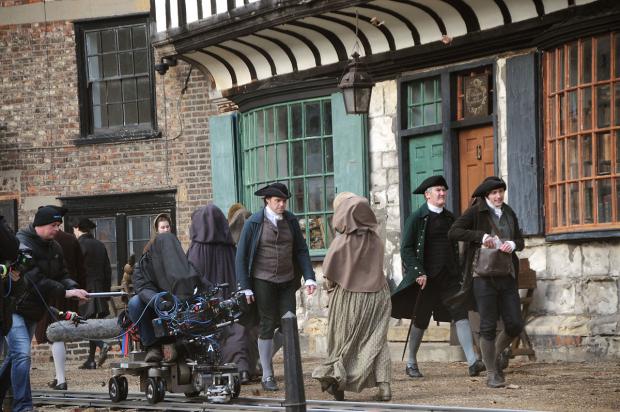 York Press: Actors walk past St William’s College as filming gets under way on Jonathan Strange & Mr Norrell