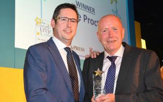 Last year’s Health Service Hero, Mike Proctor, right, receives his award   Picture: David Harrison
