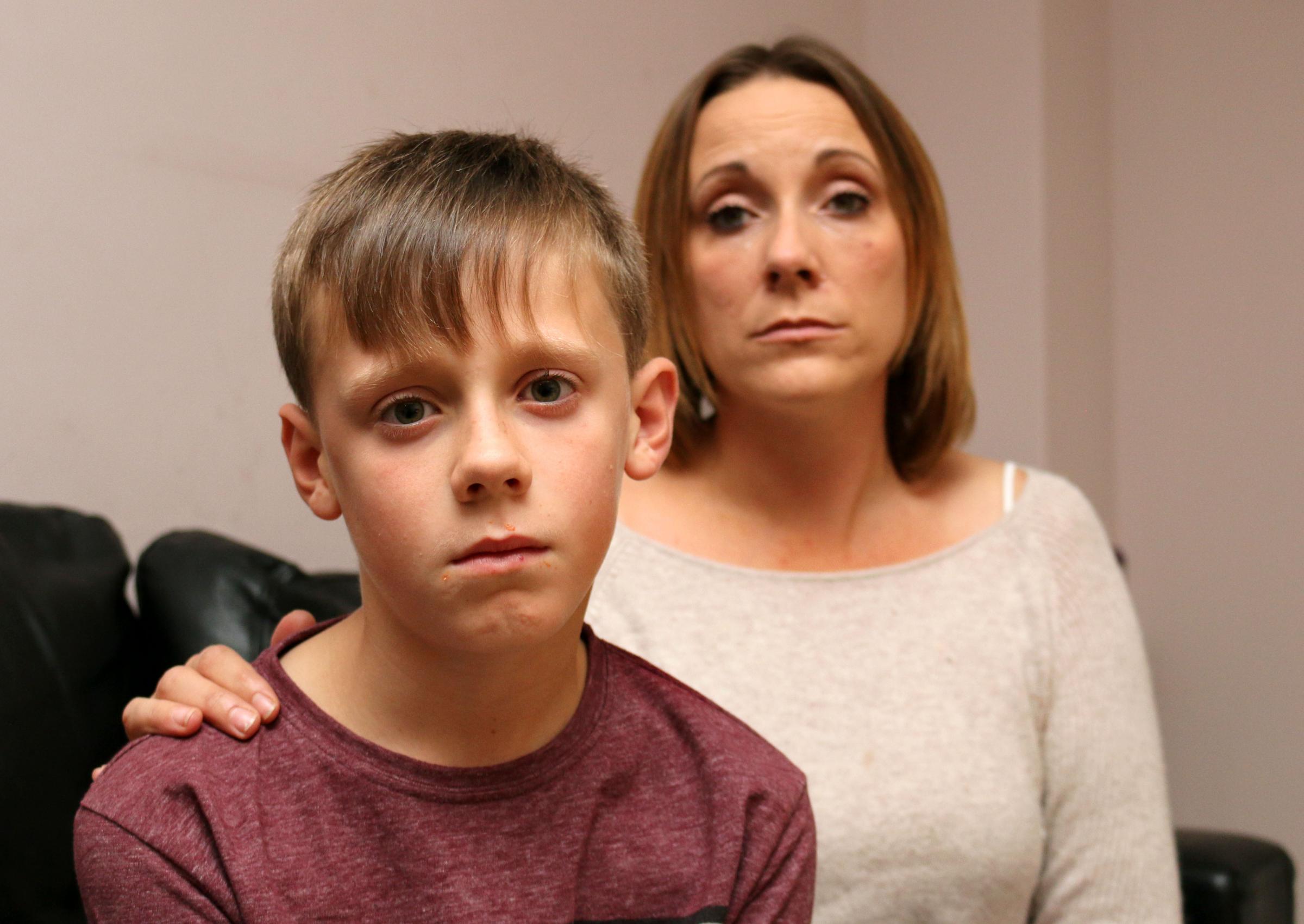 <b>Nikki Lister</b> and her son Dominic, aged ten, who ran to a friend&#39;s house - 3300173