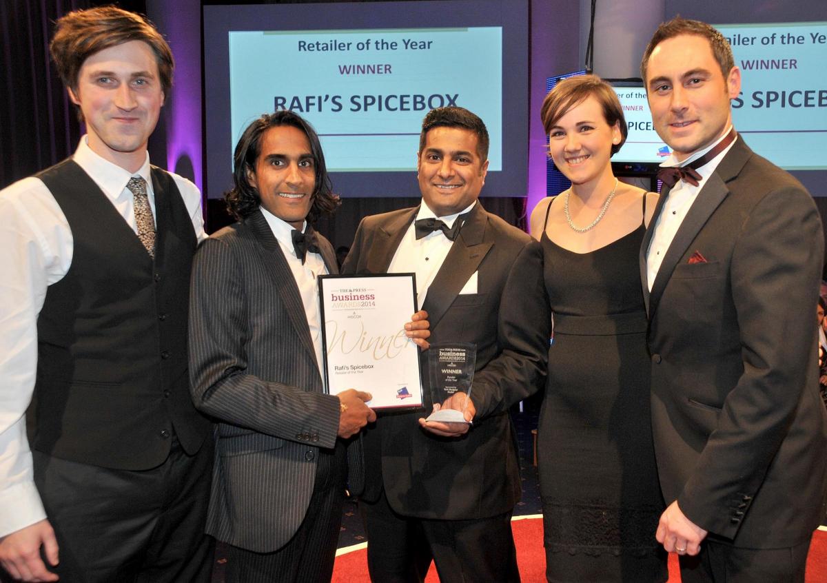 Retail Business of the Year Rafi’s Spicebox is represented by Ian Lea, left, Lee Fernandez, Kevin Fernandez and Hana Makin, who are pictured receiving the award from sponsor Paul Tyler, retail manager at York Designer Outlet