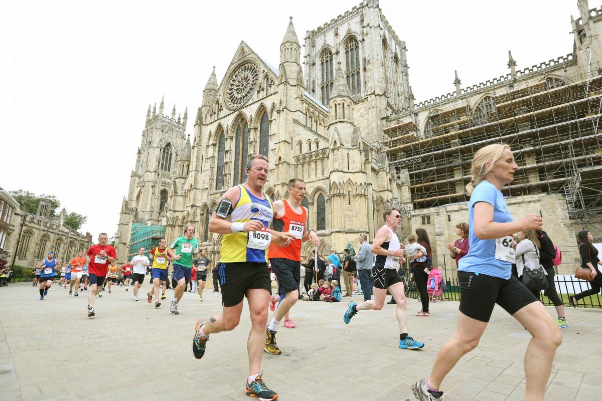 Pictures from York 10k 2015: Runners come past the Minster