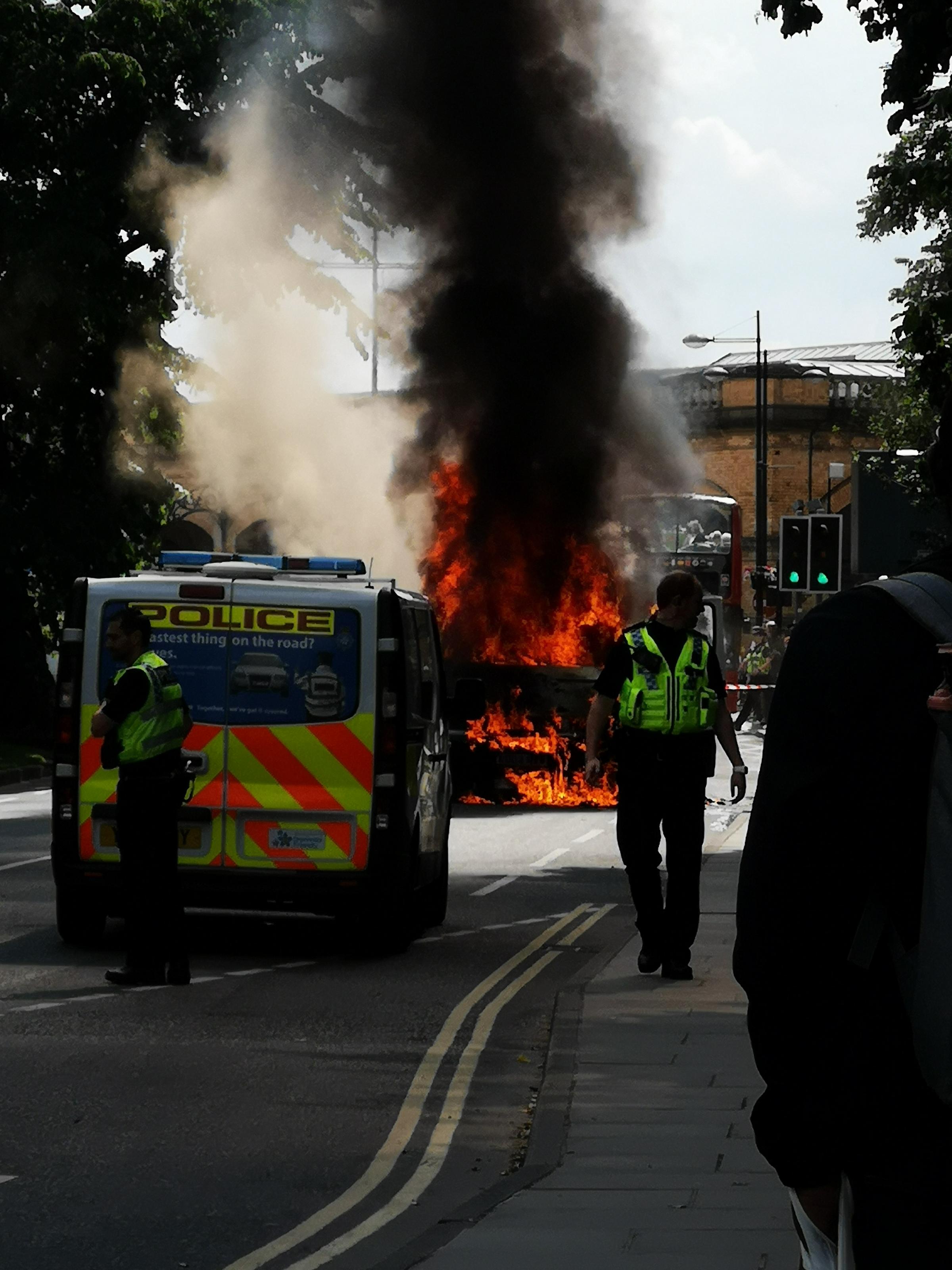 Dramatic pictures show moment minibus burst into flames near York Station