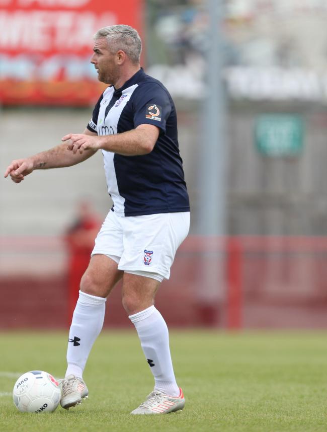 York City's Steve McNulty in action at Altrincham. Picture: Gordon Clayton