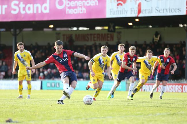 York City midfielder Andy Bond takes a penalty against Altrincham. Picture: Gordon Clayton