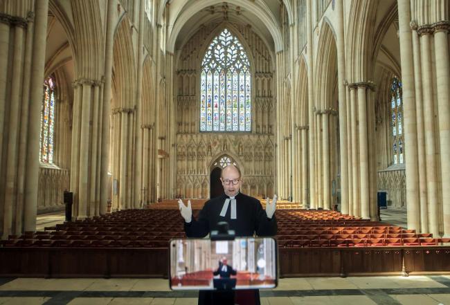 The Revd Michael Smith, York Minster’s Canon Pastor, will be exchanging the pulpit for the saddle during the Catherdrals Cycle Route. Picture:  Danny Lawson/PA Wire