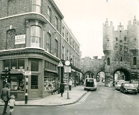 Micklegate Bar in 1972.  The For Sale sign is for the firm Lawson Larg, and the story that went with this picture described how the chemist shop was to be converted in a Victorian style restaurant by Mark Rowntree, then 27-years-old.