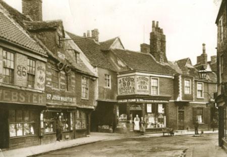 This view of Goodramgate from 1893 was taken before the opening for Deangate was made between John Wharton's glass and china shop at No 87, and J Todd's Teas and foreign wines shop at No 89. 
