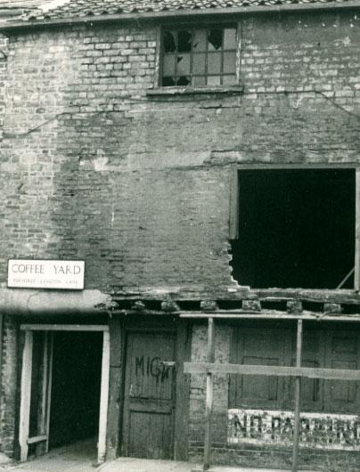 This picture was taken in 1975 just before work started to restore 19, Grape Lane into what it is today, a restaurant.  Buildings in Coffee Yard were left derelict for some time and tramps and cats often inhabited thew premises.