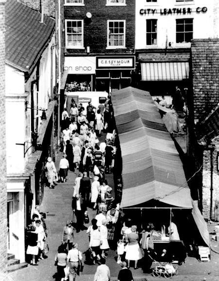 July 1981 and this view of Silver Street in York shows the York City Leather shop next to C. E. Seymour the tailors.