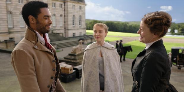 York Press: Bridgerton (l to r) Regé-Jean Page as the Duke of Hastings and Phoebe Dynevor as Daphne Bridgerton in Netflix hit Bridgerton - filmed at Castle Howard