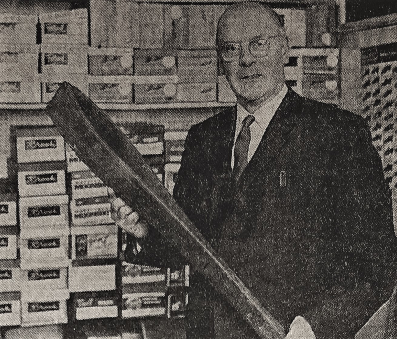 Pictured in 1971, Mr J D Webster, holding a century-old she repairers implement.