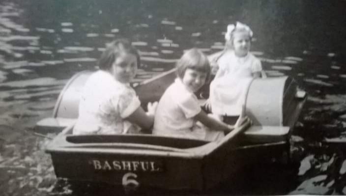 Lynne, in ribbons, on a paddle boats with her cousins in Rowntree Park in the late 1950s