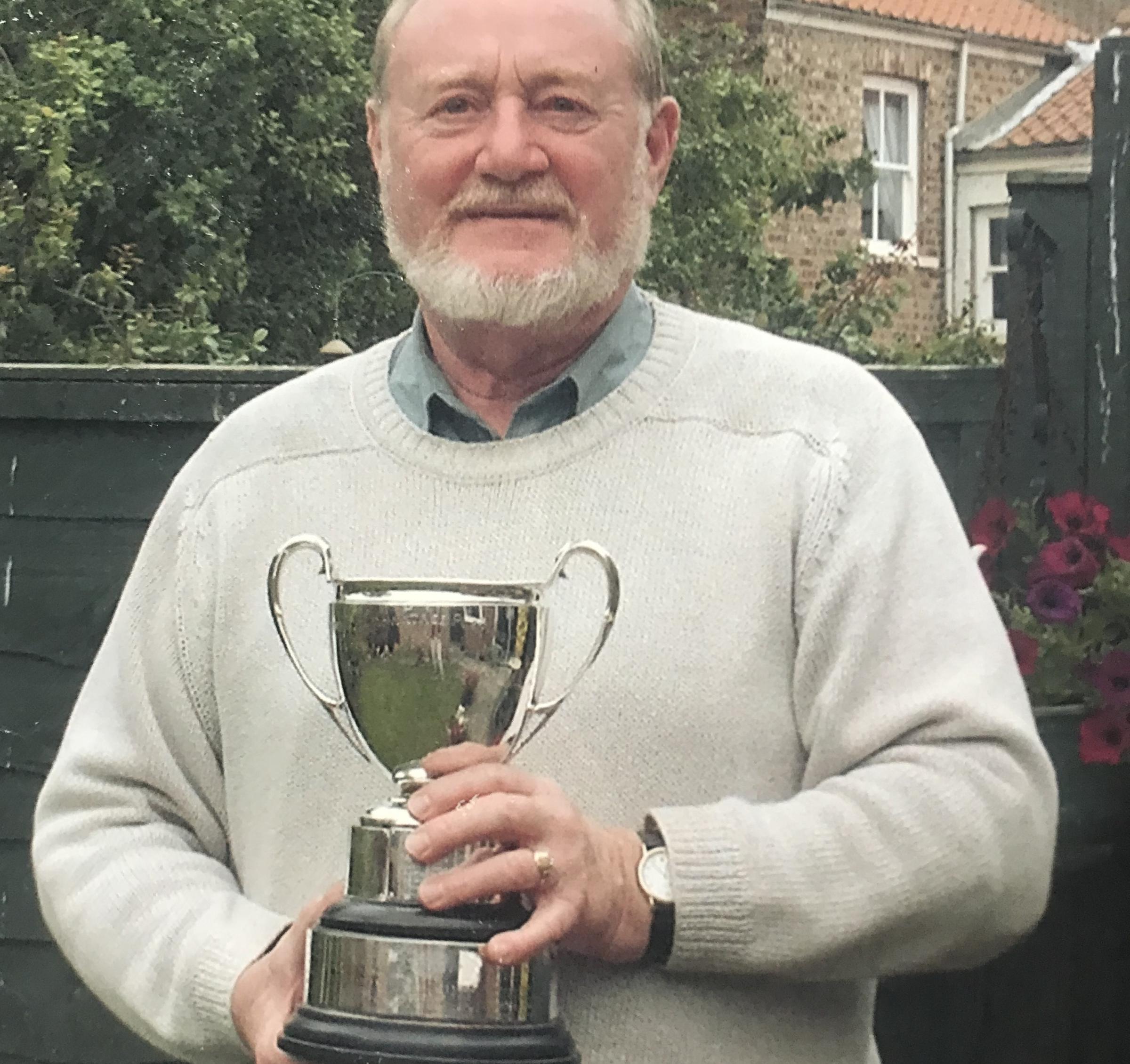 Jim Hammond with the Wallace Cup for best performances of the season