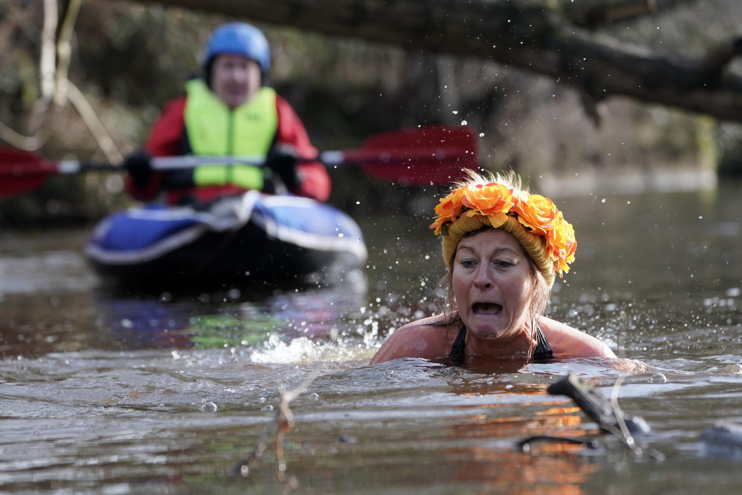 Lara Fawcett swims in the River Nidd in Knaresborough, North Yorkshire, to raise money for the Archbishop of York Youth Trust Photo: Owen Humphreys/PA Wire.