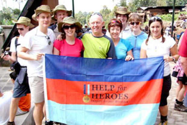 “Team Hatton” at Machame gate at the start of the trek, and though  altitude  sickness had a severe effect on its members nothing could  prevent the family and friends of Matthew Hatton, inset, from  climbing to the summit of Mount Kilimanjaro