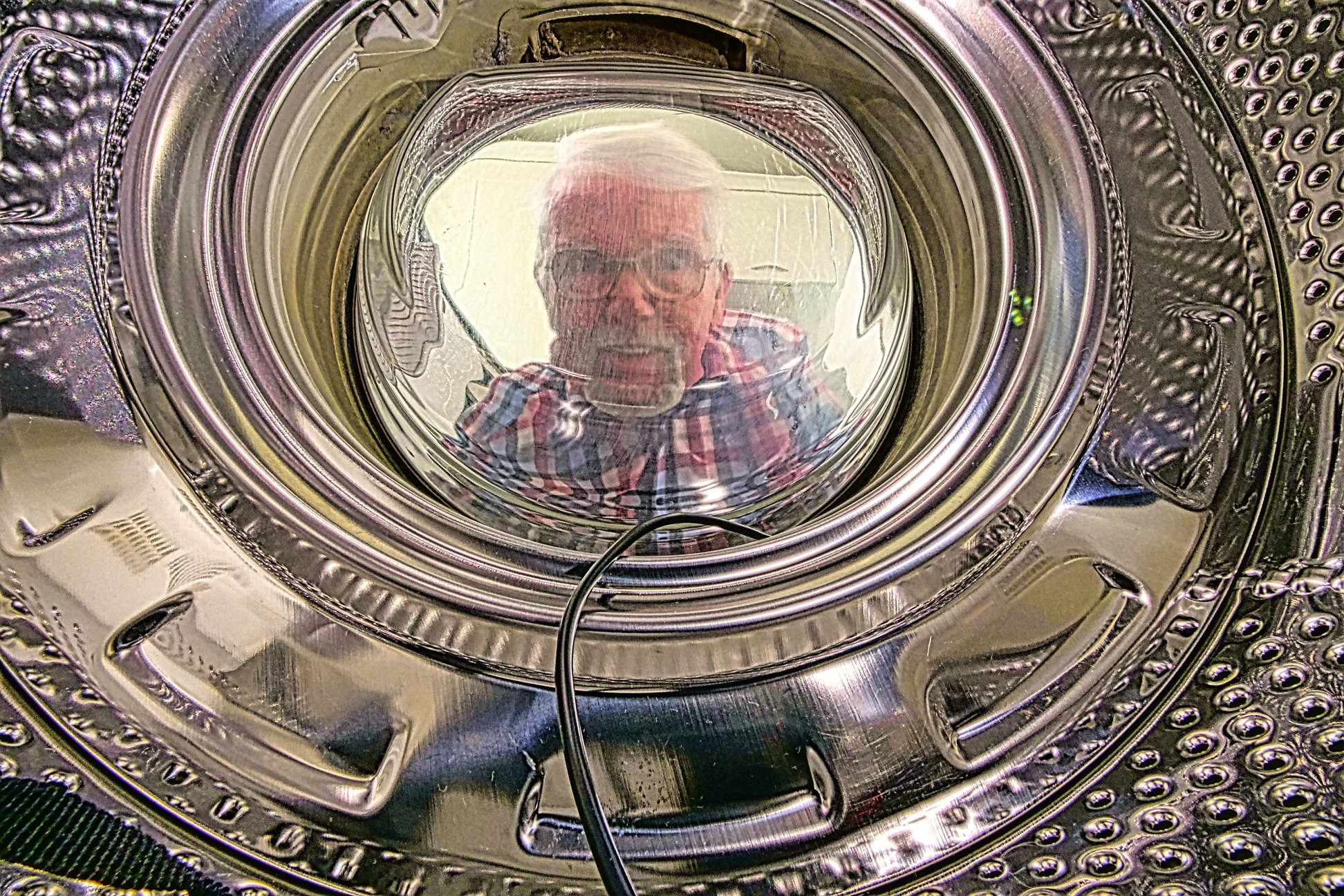 Barney Sharratt’s self-portrait taken from inside a washing machine