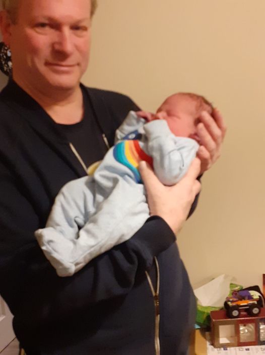 Dave with new grandsoen Jacob (born a few weeks before Dave was admitted to hospital with Covid)
